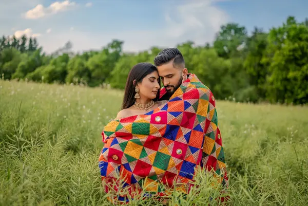 Couple portrait in a field — Weddings & Events